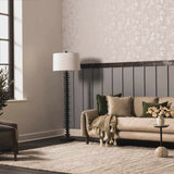 Living room scene with a beige sofa and the Arabi Wool Area Rug in light beige. Roomscene-Rectangle