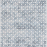 Close up of the Askeaton Washable Area Rug, featuring a geometric diamond pattern in blue, gray, and light gray hues. Design-Runner-2773