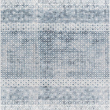 Close-up of the Askeaton Washable Area Rug. Features a geometric diamond pattern in blue, ink blue, gray and light gray. Design-Rectangle-71010