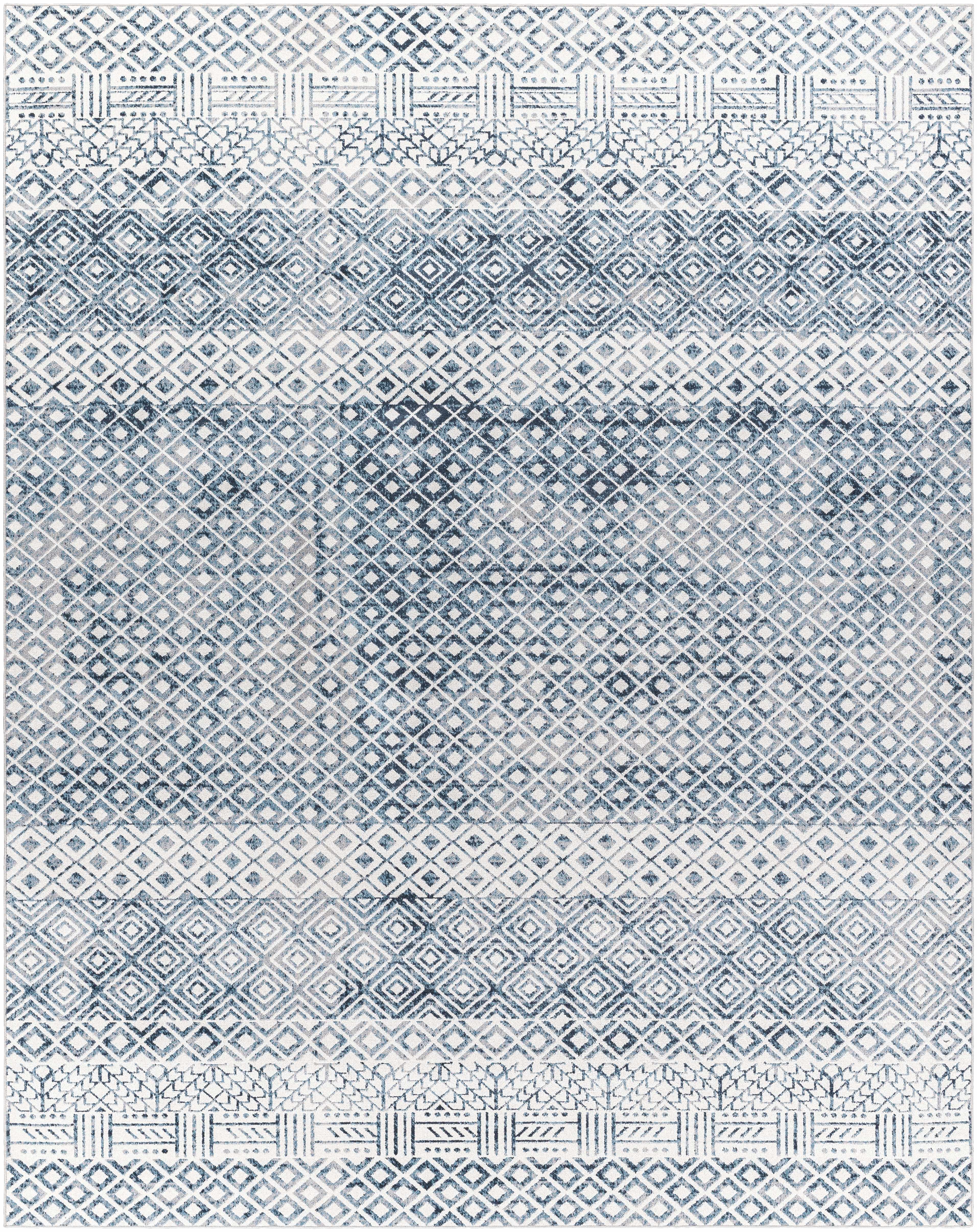 Close-up of the Askeaton Washable Area Rug. Features a geometric diamond pattern in blue, ink blue, gray and light gray. Design-Rectangle-71010