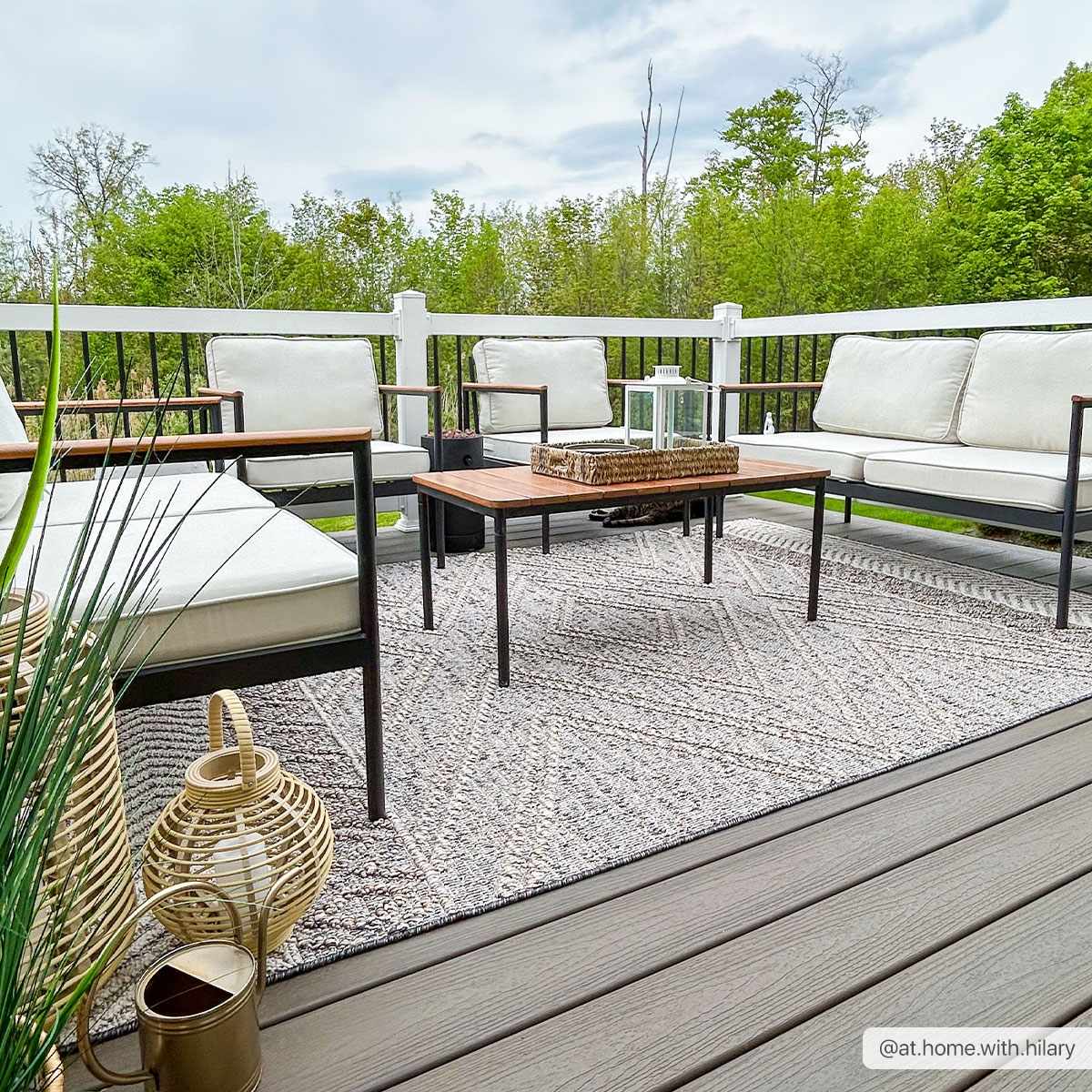 Outdoor patio scene with Beige Charcoal Areli Area Rug, modern furniture, and neutral decor creating a cozy, inviting space. Roomscene-Rectangle