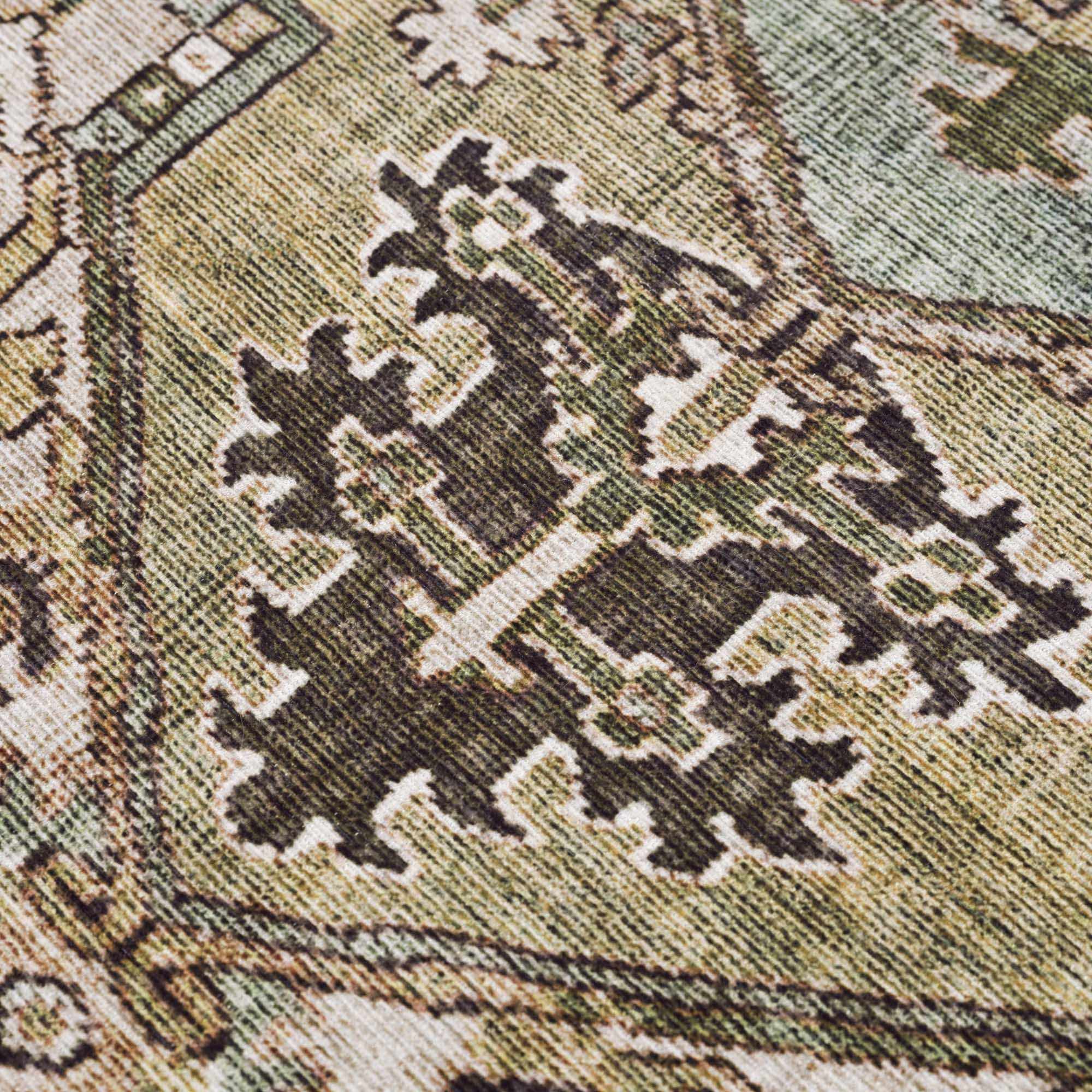 Close-up of the Neyland Sage Green Area Rug showing its traditional olive, charcoal, and cream oriental pattern. Texture