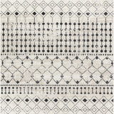 Close-up of the Joppatowne Washable Area Rug, featuring a black geometric pattern on a cream and light beige background. Design-Rectangle-71010