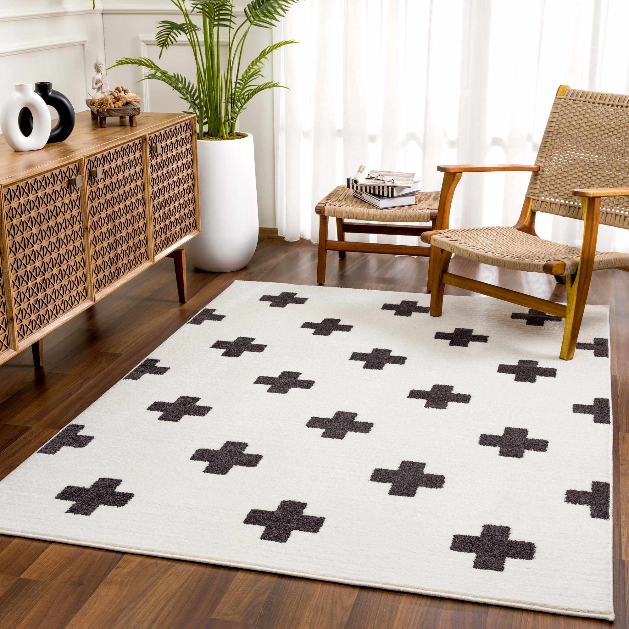 Living room scene with a white Erath Area Rug featuring a black plus sign pattern. Roomscene-Rectangle