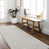 Bright entryway with a Keesa Checkered Area Rug, wood bench, and dark wood floors. Ivory and off-white tones create a serene mood. Roomscene-Runner