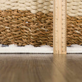 Close-up of the Anah Blue Outdoor Rug showing the rug's pile height and texture with a ruler for scale. Pile