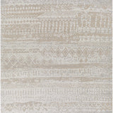 Close-up of a Tupsan Washable Area Rug in cream, light beige, and light gray with a contemporary geometric pattern. Design-Rectangle-537