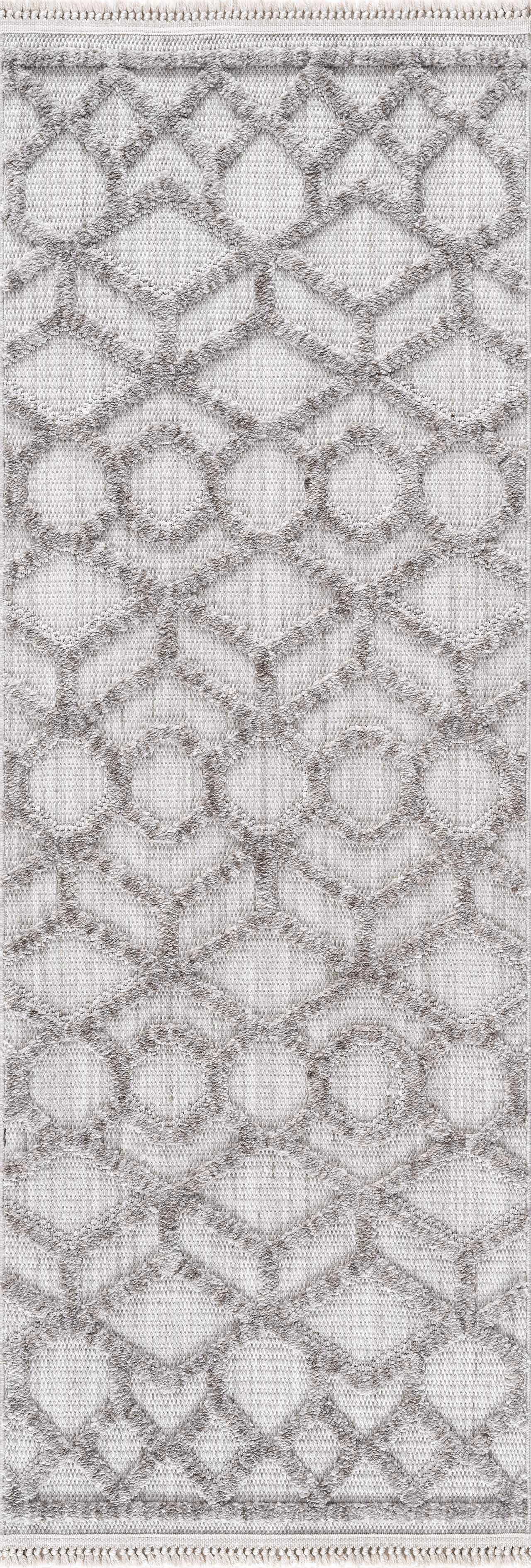Close-up of the Borbon Area Rug, a machine-woven rug with a geometric gray and cream diamond and circle pattern. Design-Runner-2773