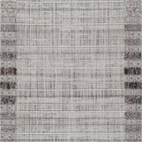Close-up of the Naivasha Elegant High/Low Area Rug featuring charcoal, cream, and gray tones with a textured, geometric pattern. Design-Rectangle-537