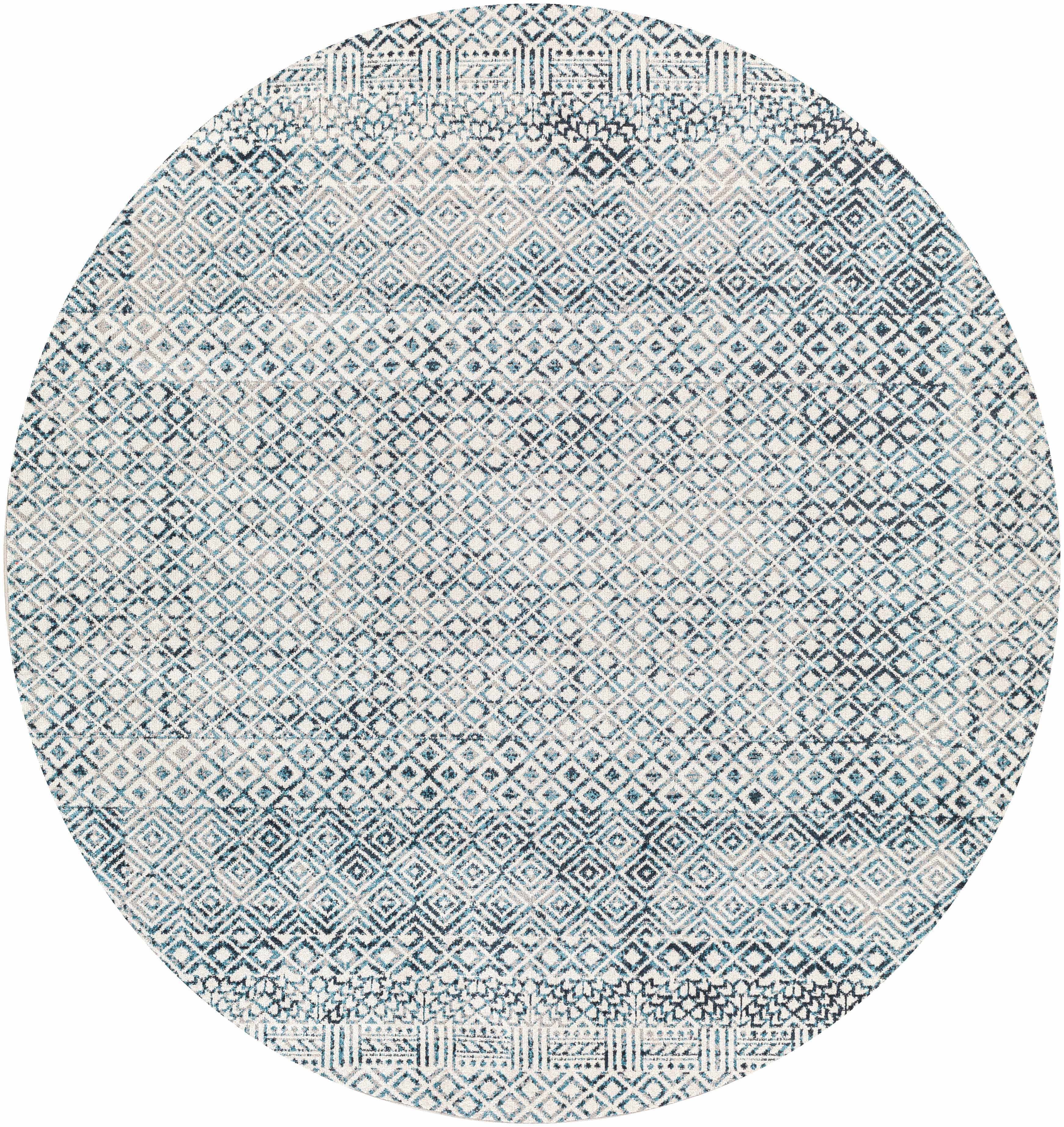 Close-up of round Askeaton Washable Area Rug. Features a diamond pattern in blue, gray, and light gray hues. Contemporary style. Design-Round-67