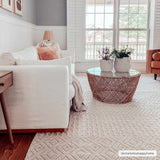 Living room scene with white sofa and Ryne Area Rug in driftwood and white thatch colors. Roomscene-Rectangle