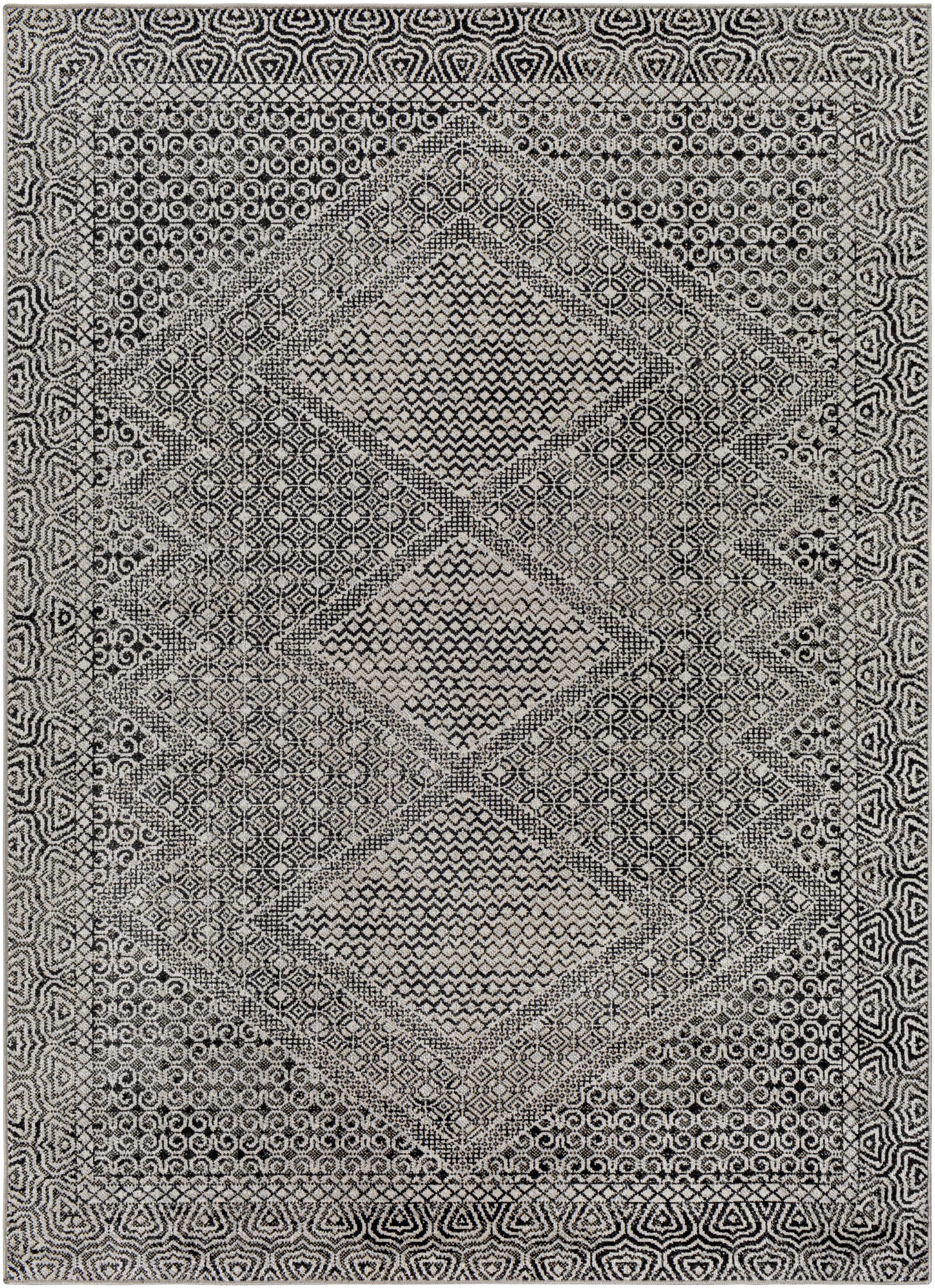 Close-up of the Consuelo Washable Area Rug, featuring a black and gray oriental-inspired geometric pattern. Design-Rectangle-537