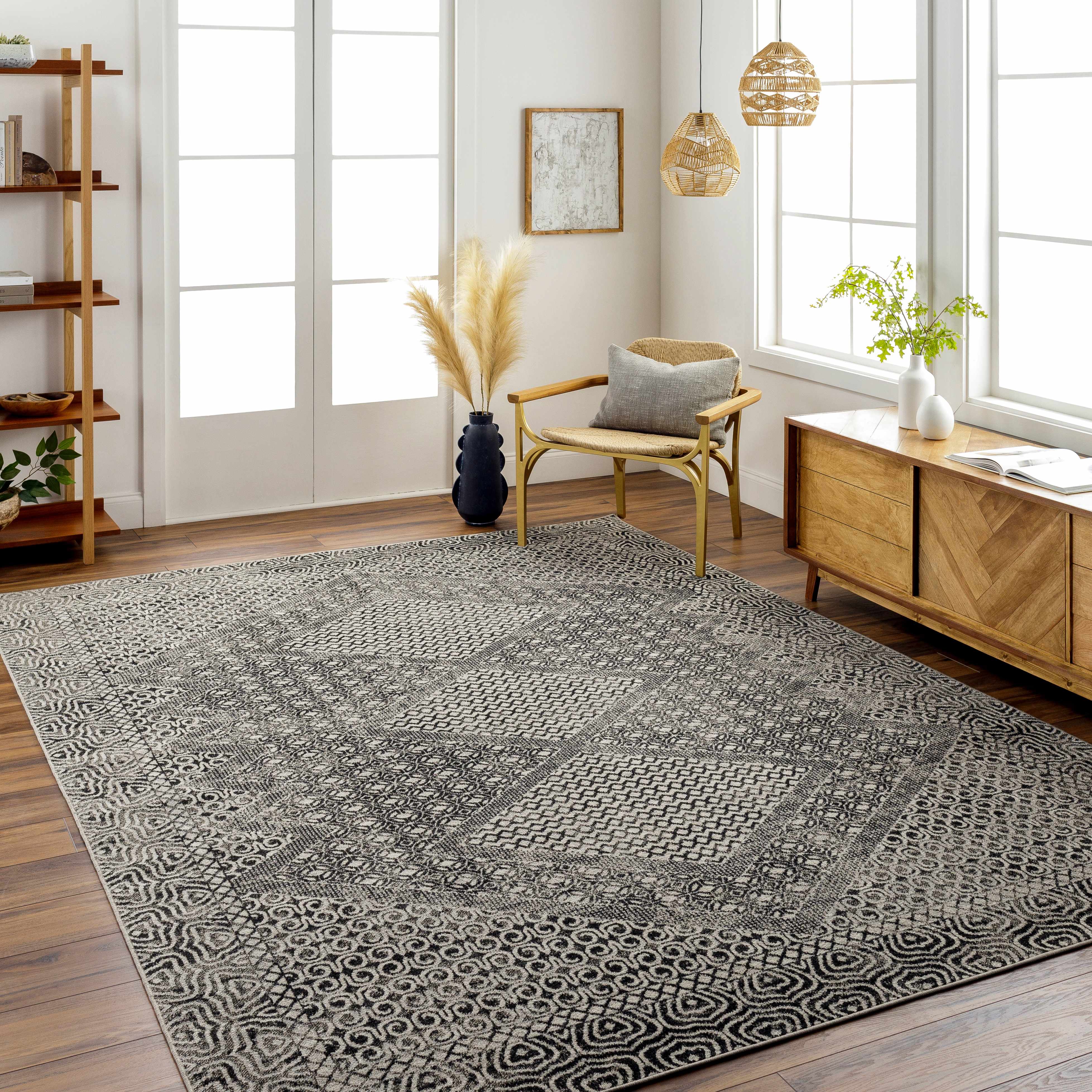 Living room with farmhouse decor featuring the black and gray Consuelo Washable Area Rug. Roomscene-Rectangle