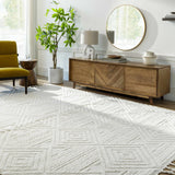 Living room with a Bone Manyas 3D Area Rug, wood console table, round mirror, and olive green chair. Roomscene-Rectangle