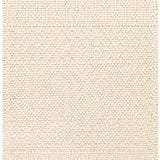 Close-up of the Ryne Area Rug in white thatch. Hand-woven rug with geometric patterns and fringe. Bohemian, farmhouse style. Design-Runner-268