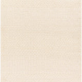 Close-up of the Ryne Area Rug, a hand-woven, white thatch rug with a subtle geometric pattern and fringe detail. Design-Rectangle-576