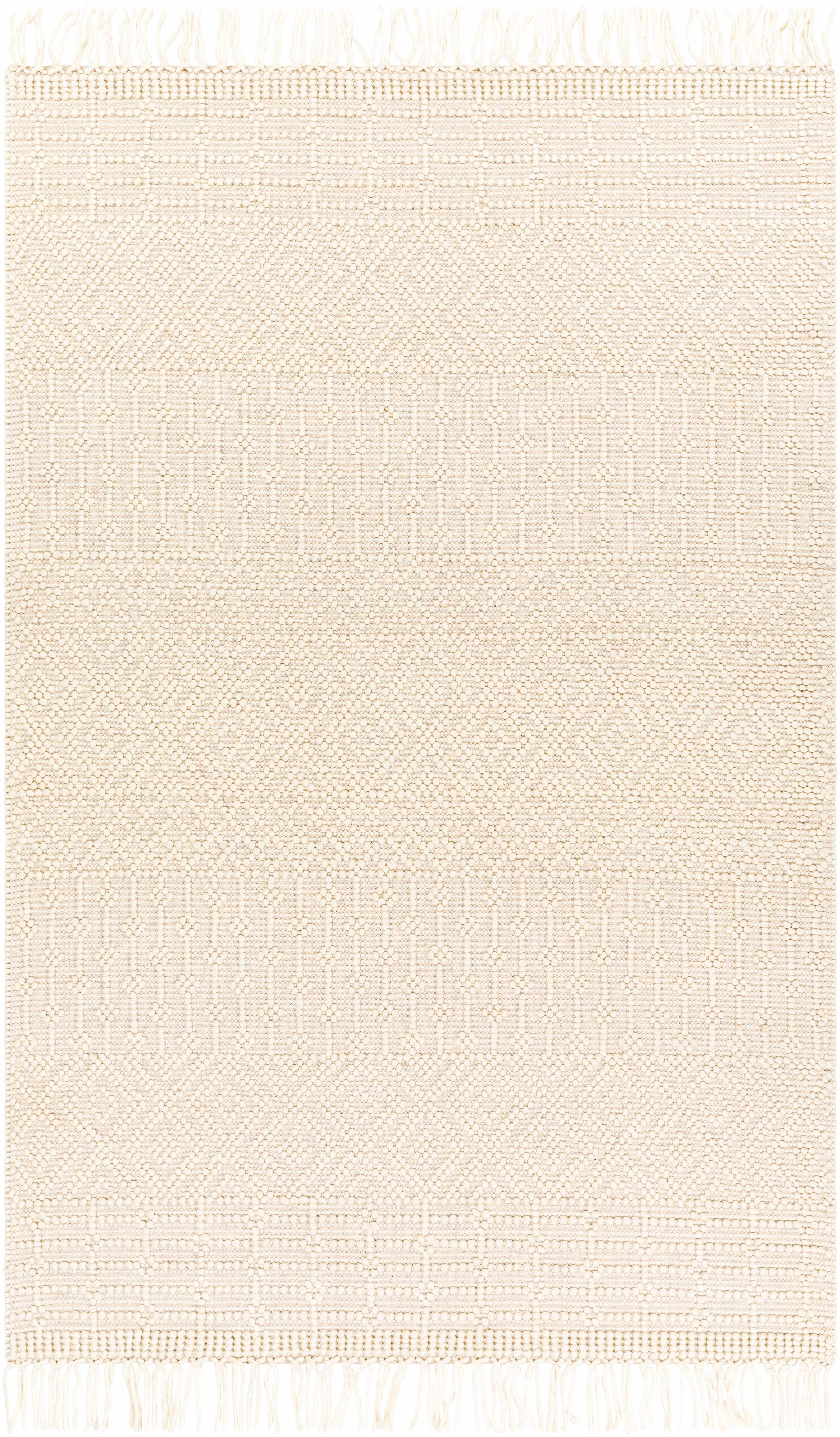 Close-up of the Ryne Area Rug, a hand-woven, white thatch rug with a subtle geometric pattern and fringe detail. Design-Rectangle-576