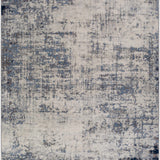 Texanna Abstract Blue/Gray Area Rug with a distressed, contemporary design in light blue, gray, navy, and off-white. Design-Rectangle-537