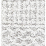 Close-up of the Vernonburg Shag Area Rug. Light gray and white shag rug with a soft, textured design. Design-Rectangle-23